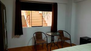 Letto o letti in una camera di Hostal Cusco de mis Sueños