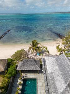 an aerial view of the beach and the ocean at Koki Bonheur by muse villas in Poste Lafayette