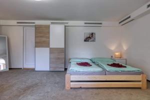 Postel nebo postele na pokoji v ubytování Apartmán U Peciho