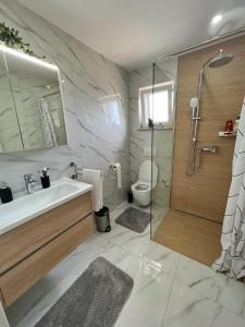 Kúpeľňa v ubytovaní Villa LONGO
