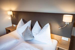 Łóżko lub łóżka w pokoju w obiekcie Apartments Untersüßgut Eben