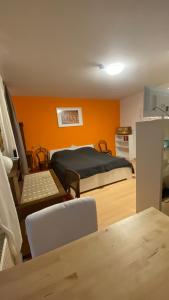 a bedroom with a bed and a staircase in it at Altes Stadtgut am Bauhaus Museum in Weimar