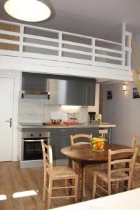 Una cocina o kitchenette en Le Clos Beaufleury