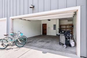 a garage with a bike parked inside of it at Spectacular Home near Breweries & River District! in Fort Collins