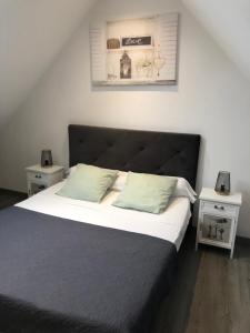 Posteľ alebo postele v izbe v ubytovaní Bazicourt: dépendance proche Parc Astérix et Paris