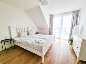 Rúm í herbergi á Dům na jihu Mikulov s finskou saunou