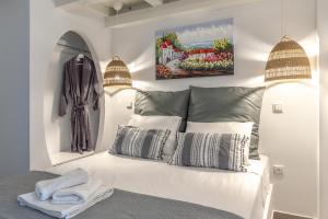A bed or beds in a room at Pallas Seaside 2