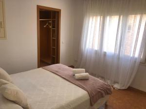 Posteľ alebo postele v izbe v ubytovaní Casa Veuràs Girona - Montilivi