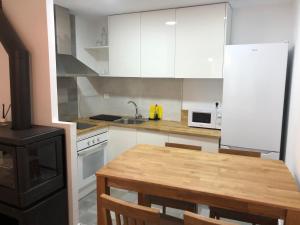 Kuchyň nebo kuchyňský kout v ubytování Casita Pelopin