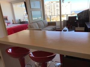 Postel nebo postele na pokoji v ubytování DEPARTAMENTO EN RESORT LAGUNA DEL MAR + 21 fotografií