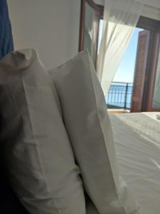 A bed or beds in a room at atoll 'Paris-Alexandre'
