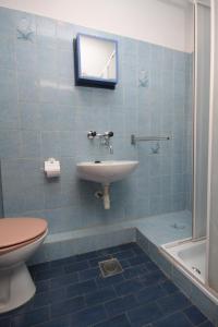 Kúpeľňa v ubytovaní Triple Room Pasman 8223a