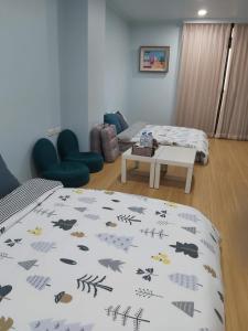Postel nebo postele na pokoji v ubytování Chin-Lan B&B