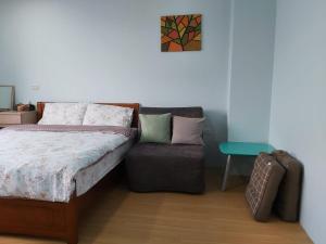 Postel nebo postele na pokoji v ubytování Chin-Lan B&B