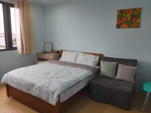 Postel nebo postele na pokoji v ubytování Chin-Lan B&B