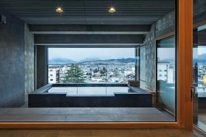 a house with a plunge pool with a view at Matsumoto Jujo in Matsumoto