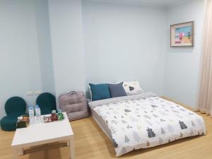 Postel nebo postele na pokoji v ubytování Chin-Lan B&B