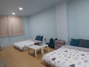 Postel nebo postele na pokoji v ubytování Chin-Lan B&B
