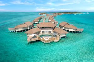 an aerial view of a resort in the ocean at Intercontinental Maldives Maamunagau Resort with Club benefits - IHG Hotel in Raa Atoll