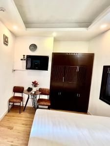 DDA Hotel District 1- Bùi Viện-Đề Thám Walking Street TV 또는 엔터테인먼트 센터