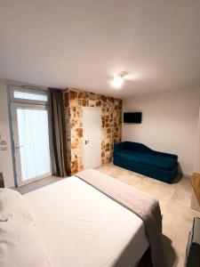 Postel nebo postele na pokoji v ubytování Olea Relais