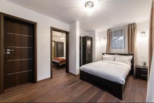 Postel nebo postele na pokoji v ubytování Chalet Belmont