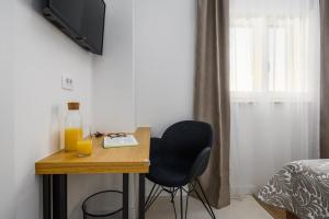 TV a/nebo společenská místnost v ubytování Vila Lavanda Muntrilj