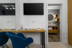 TV a/nebo společenská místnost v ubytování Vila Lavanda Muntrilj