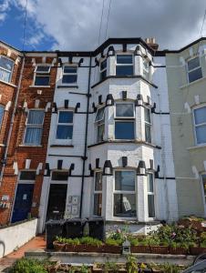 an apartment building on the corner of a street at Sea View Sanctuary Apartment! in Margate