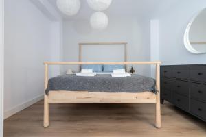 Postel nebo postele na pokoji v ubytování Casa señorial en el corazón del Puerto by Hometels