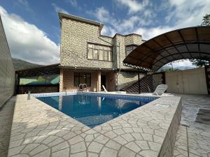 Bazén v ubytování Qafqaz VIP Villa nebo v jeho okolí