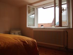 Postel nebo postele na pokoji v ubytování Di Baut