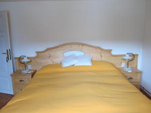 Postel nebo postele na pokoji v ubytování Di Baut