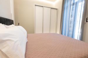Posteľ alebo postele v izbe v ubytovaní BillMar Luxury Apartment in the center of Gythio