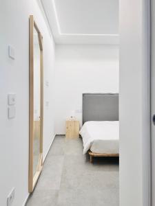 Lova arba lovos apgyvendinimo įstaigoje ALC2 Appartamento nel centro di San Giovanni Alcova