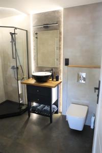 Ванна кімната в Tortuga Apartments