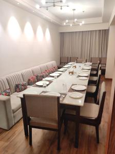a large conference room with a long table and chairs at Clarks Inn Express Ludhiana in Ludhiana