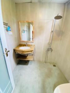 Koupelna v ubytování Sundale Hotel