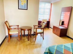 Posezení v ubytování Sundale Hotel