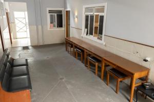 Uma área de estar em Hostel Diniz