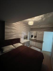 Postel nebo postele na pokoji v ubytování Kozapark Residance