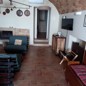TV a/nebo společenská místnost v ubytování La Cisterna del Vicinato