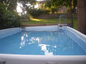 Bazén v ubytování Locanda Montegiovi nebo v jeho okolí