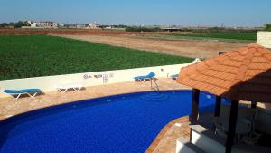 A view of the pool at Stunning Spacious 2-Bed Apartment in Liopetri or nearby
