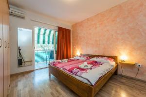 Ein Bett oder Betten in einem Zimmer der Unterkunft Guest House Malenica