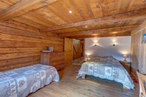 เตียงในห้องที่ Chalet Panoramique