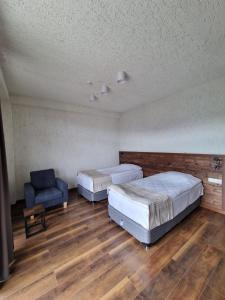 Letto o letti in una camera di Apaga Resort