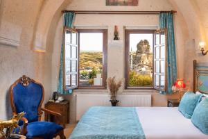 Postel nebo postele na pokoji v ubytování Cappadocia Oba Cave Hotel + 37 fotografií