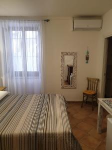 Postel nebo postele na pokoji v ubytování Kalimaka Bed & Breakfast