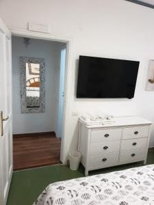 TV a/nebo společenská místnost v ubytování Kalimaka Bed & Breakfast